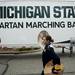 A member of the Michigan Marching Band walks by the Michigan State band's truck on Saturday. Daniel Brenner I AnnArbor.com